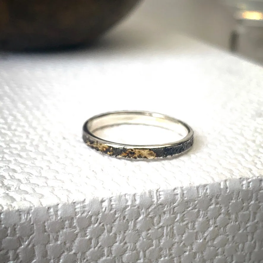 Solid sterling silver and gold ring. Size Q